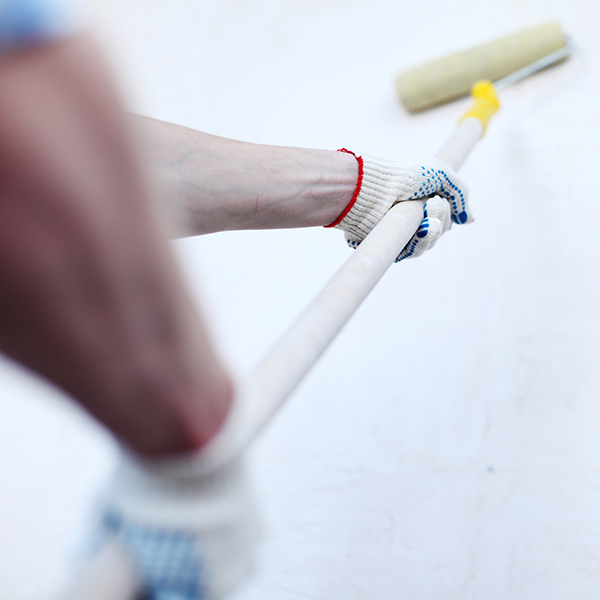 man-with-paint-roller-extreme-steam-carpet-cleaning